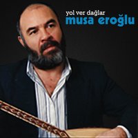 Karşıdan Geliyor Bir Çift Araba - Musa Eroğlu